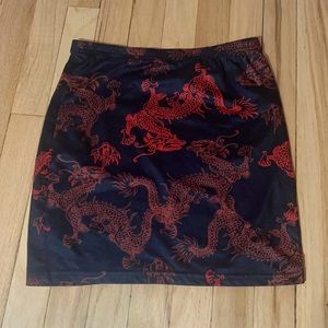 Red and black dragon skirt// tight fitting// stretchy material// never worn
